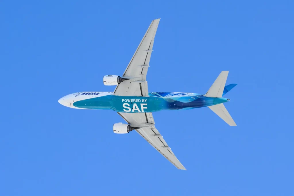 Boeing 777 underside with powered by SAF Sustainable Aviation Fuel at Everett, WA